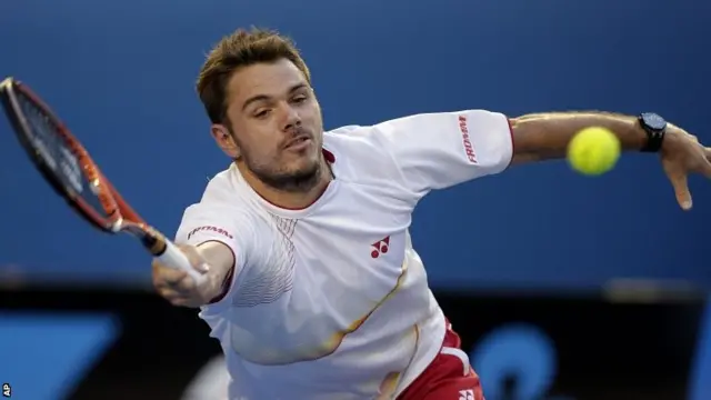 Stanislas Wawrinka of Switzerland makes a forehand return