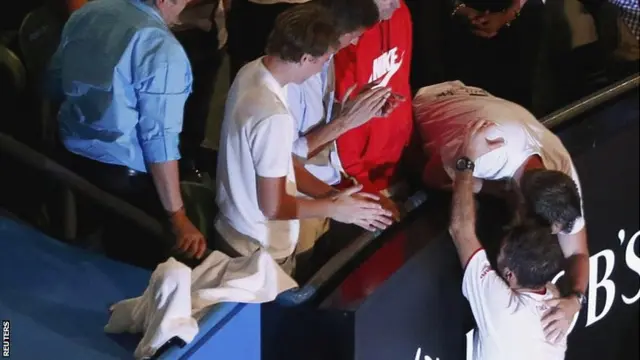 Stanislas Wawrinka hugs Magnus Norman