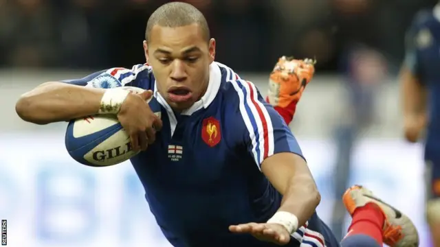 Gael Fickou dives over for a vital try for France