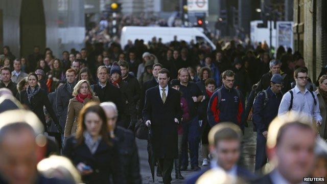 Commuters walk to work