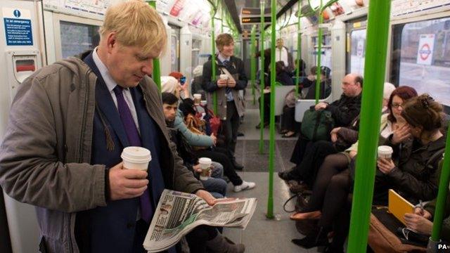 Boris Johnson takes the tube on the District Line from Southfields