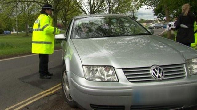 police officer taking to motorist