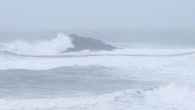 Goose Rock off Crantock Beach in Newquay being attacked by another wave