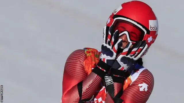 Switzerland"s Dominique Gisin reacts during the Women"s Alpine Skiing Downhill at the Rosa Khutor Alpine Center during the Sochi Winter Olympics