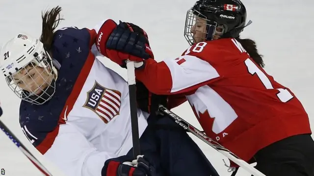 Hilary Knight of the United States collides with Catherine Ward of Canada