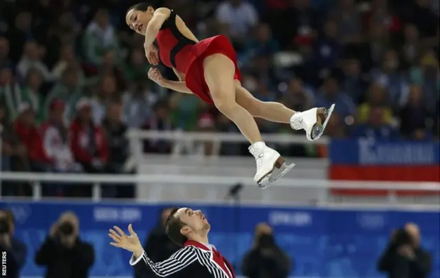 Ksenia Stolbova (top) and Fedor Klimov of Russia