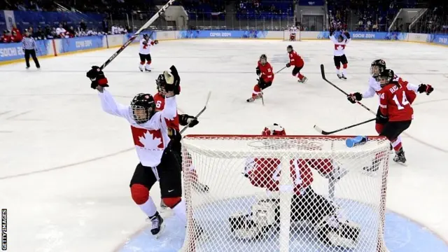 Canada's Meghan Agosta-Marciano celebrates