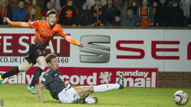 Dundee United's Andrew Robertson scores against Partick Thistle