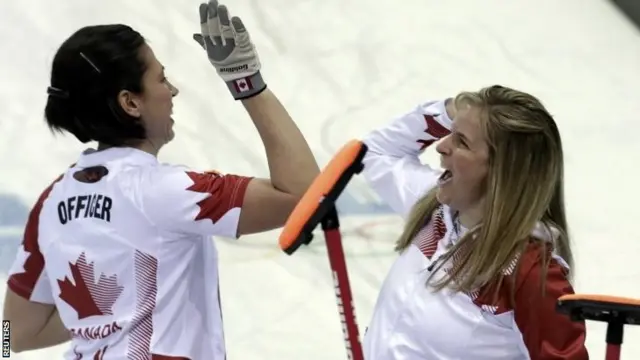 Jennifer Jones (right) celebrates