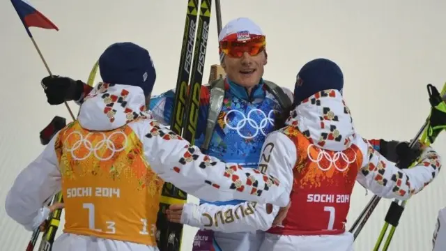 Norway's Ole Einar Bjoerndalen wins biathlon mixed relay to secure record-breaking 13th Winter Olympic medal