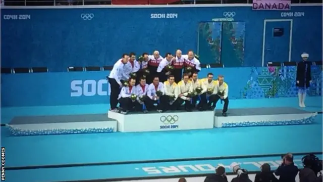 Team GB men's curlers at flower ceremony