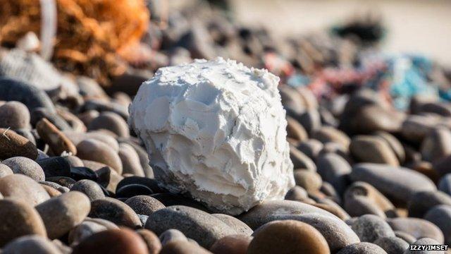 A lump of the unidentified oil substance on Chesil Beach