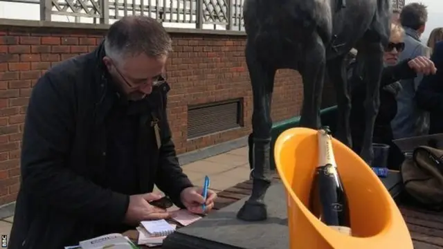 Punter studying form