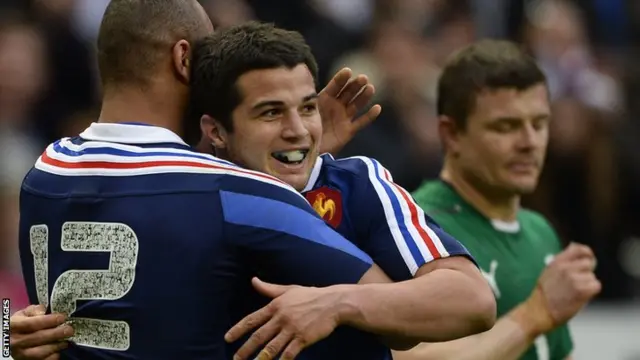 Brice Dulin celebrates with France"s centre Gael Fickou