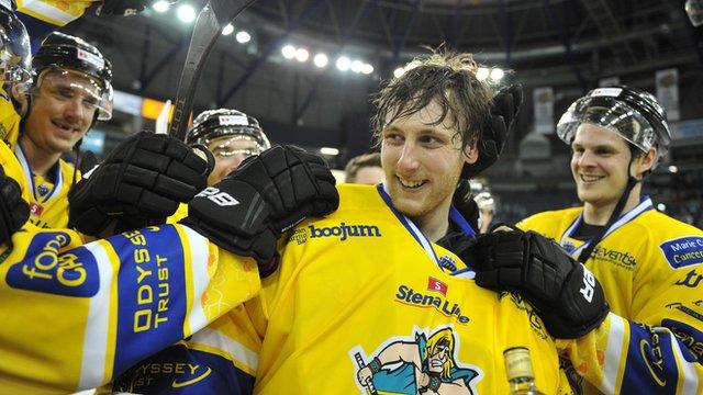 Giants players celebrate with netminder Andrew Dickson on his first home start for the Belfast side