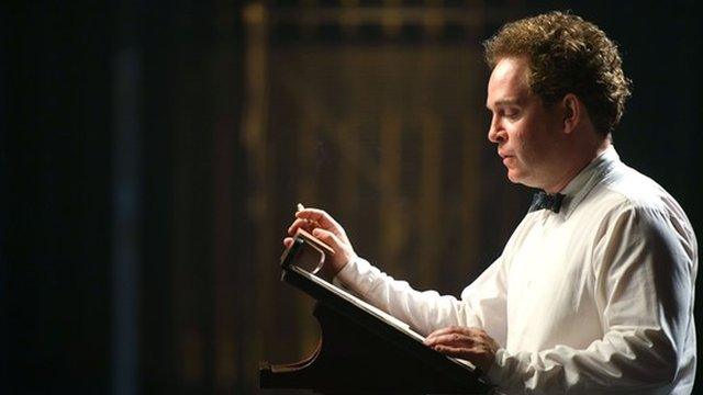 Tom Hollander as