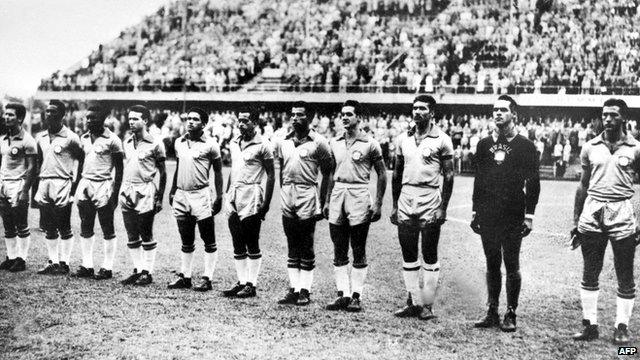 The Brazilian team listens to the national anthem in Sweden on 29 June 1958