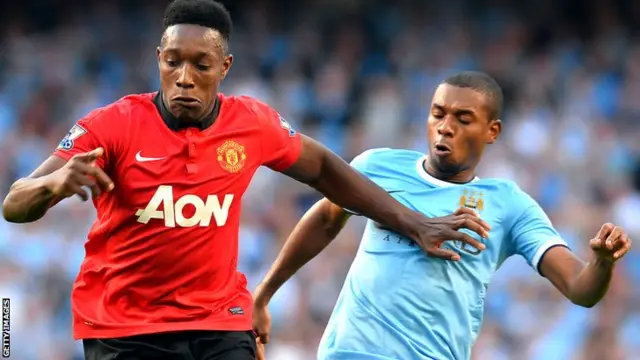 Fernandinho chases Danny Welbeck