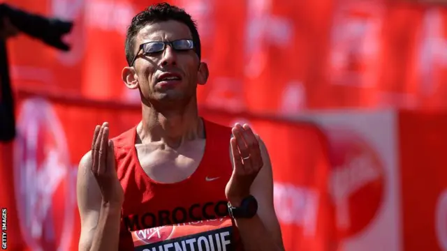 El Amin Chentouf of Morocco celebrates after winning the IPC London Marathon