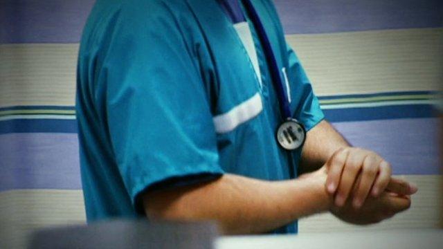 A doctor washing his hands