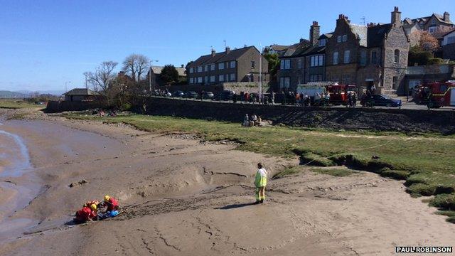 Boy being rescued