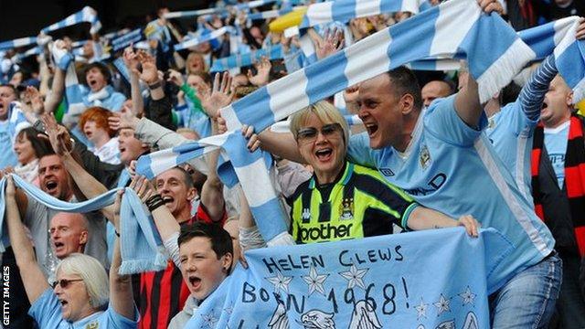 Manchester City fans celebrate their Premier League title win in 2012 after beating QPR