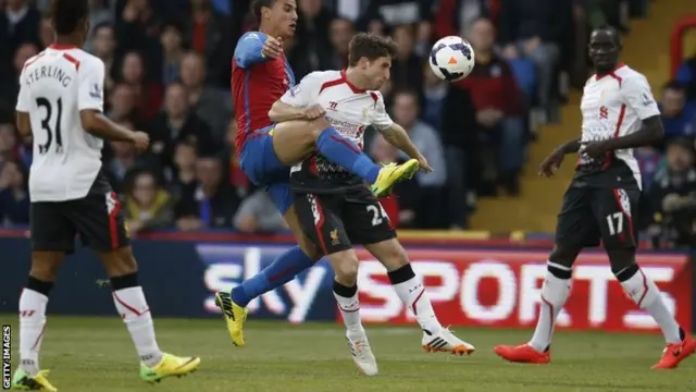 Liverpool's Joe Allen challenges Crystal Palace's Marouane Chamakh