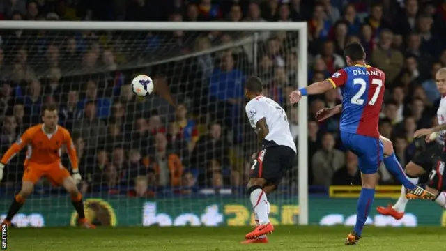 Damien Delaney scores a goal against Liverpool