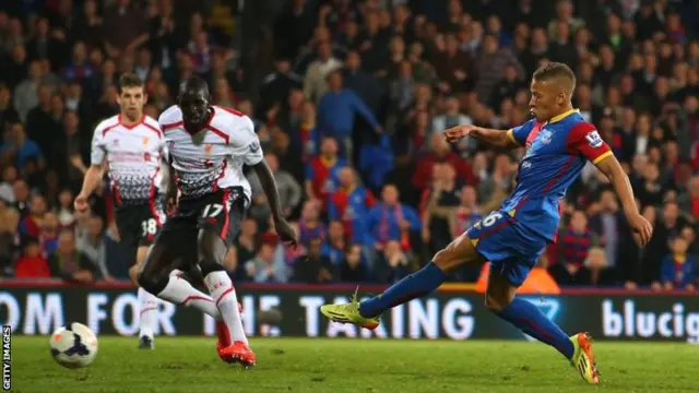 Dwight Gayle of Crystal Palace scores his team's third goal