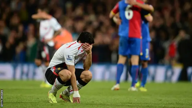 Liverpool striker Luis Suarez reacts as Crystal Palace score in a 3-3 draw at Selhurst Park