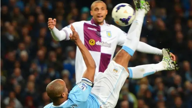 Vincent Kompany fluffs an overhead kick