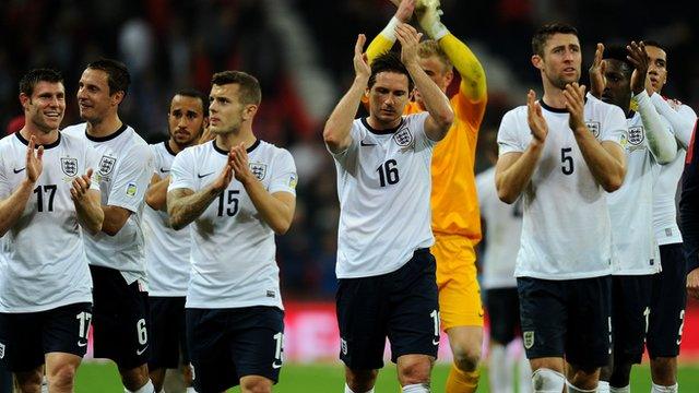 England thank the fans after beating Poland 2-0 at Wembley to reach the World Cup finals in Brazil