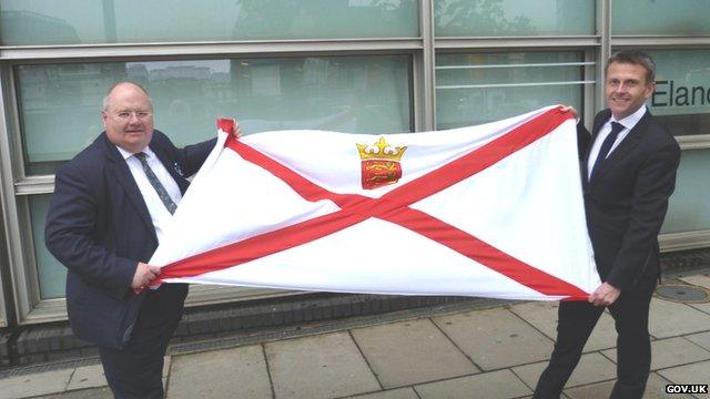 Eric Pickles and Philip Ozouf with Jersey flag