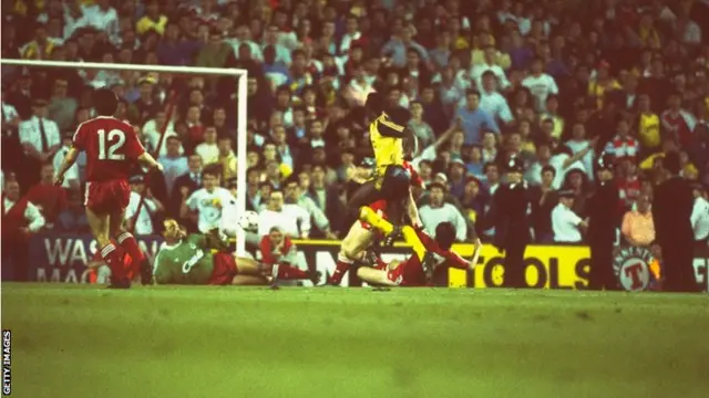 Michael Thomas scores against Liverpool in 1989