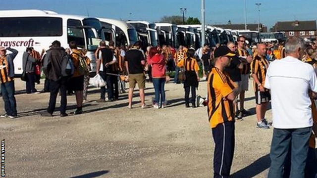 Hull City fans prepare to board coaches to Wembley