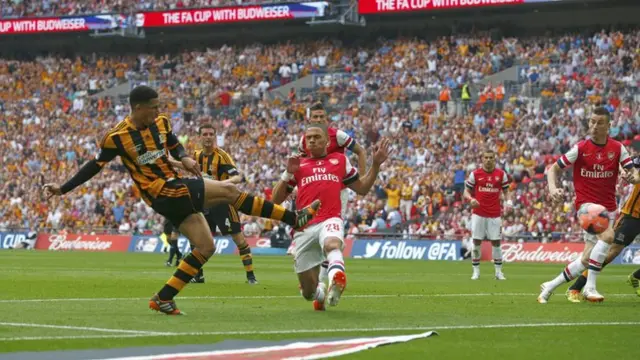 Curtis Davies scores his side's second goal in the FA Cup final against Arsenal