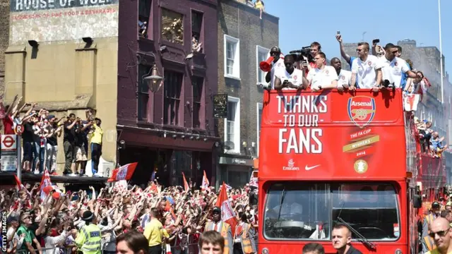 Arsenal fans turn out for the club's FA Cup open top bus parade