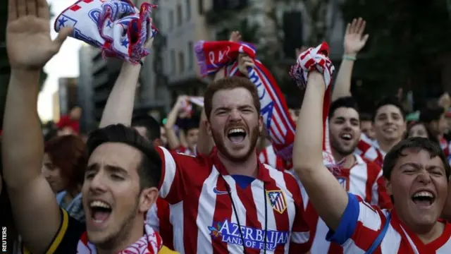 Atletico Madrid fans celebrating after the club win La Liga for the first time since 1996