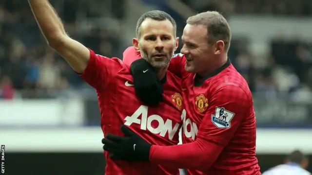 Manchester United's Ryan Giggs with team-mate Wayne Rooney