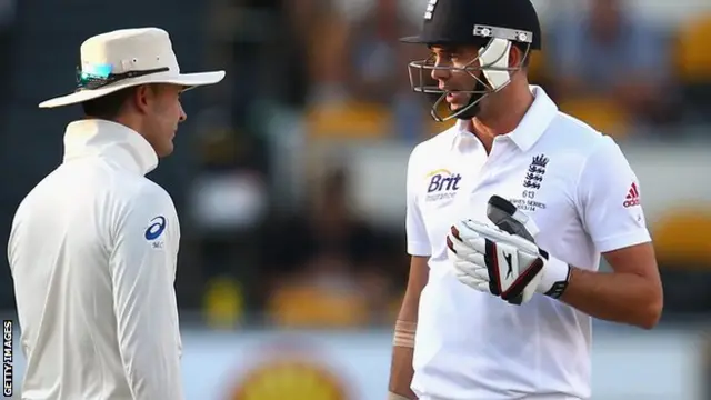 Australian captain Michael Clarke confronting England bowler James Anderson