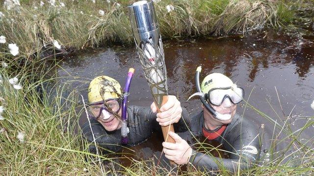 Bog snorkelers with the Baton at Peatlands Park, Dungannon