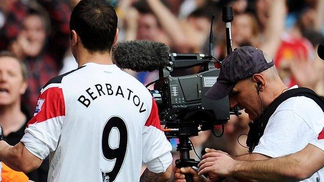 A TV camera at Manchester United match in 2011