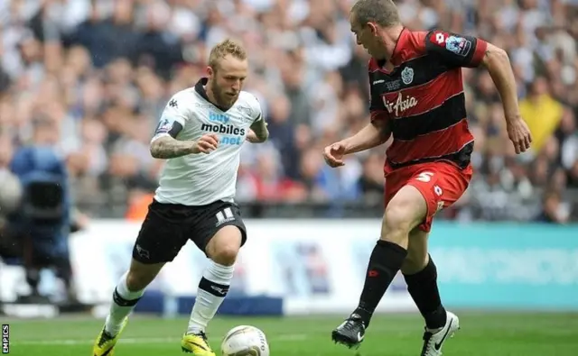 Johnny Russell takes on Richard Dunne