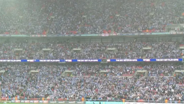 QPR fans in the rain