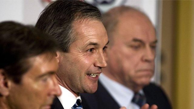 Scotland manager George Burley with the SFA's Gordon Smith and George Peat