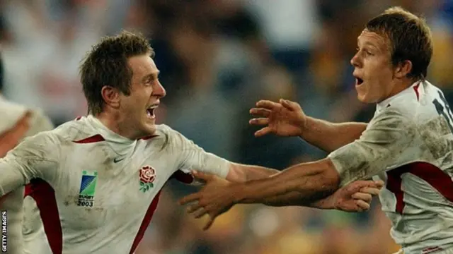 England's Will Greenwood (L) celebrates with Jonny Wilkinson at the end of the 2003 Rugby World Cup final against Australia