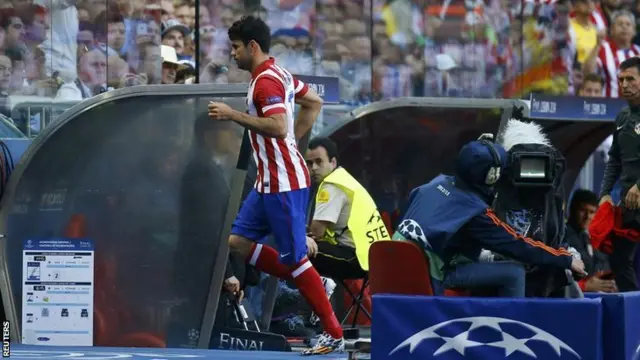 Diego Costa leaves the pitch after being substituted due to injury