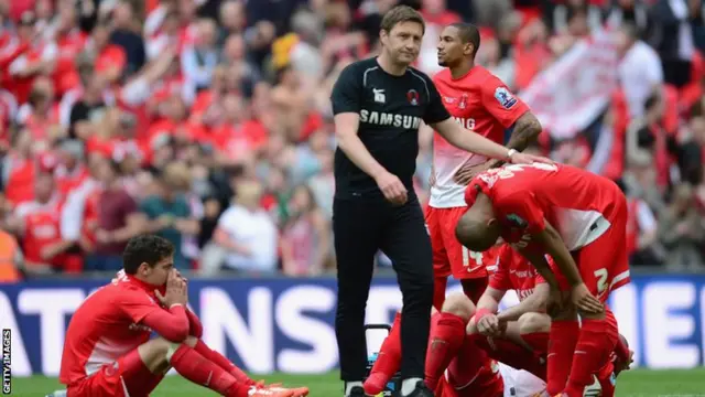 Leyton Orient players distraught after loss
