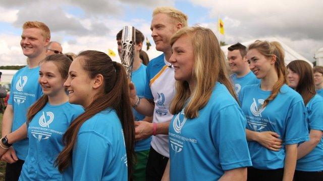 Iwan Thomas with the baton