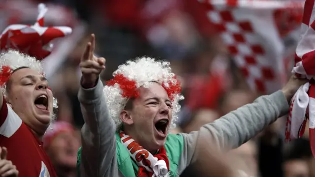 Fleetwood fans celebrate promotion to League One following their play-off final win over Burton Albion at Wembley